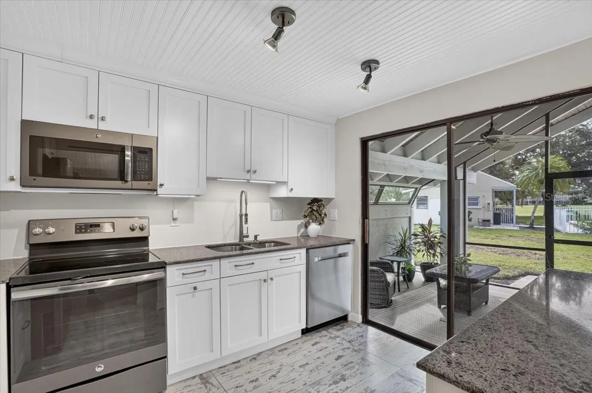 kitchen with slider to the lanai