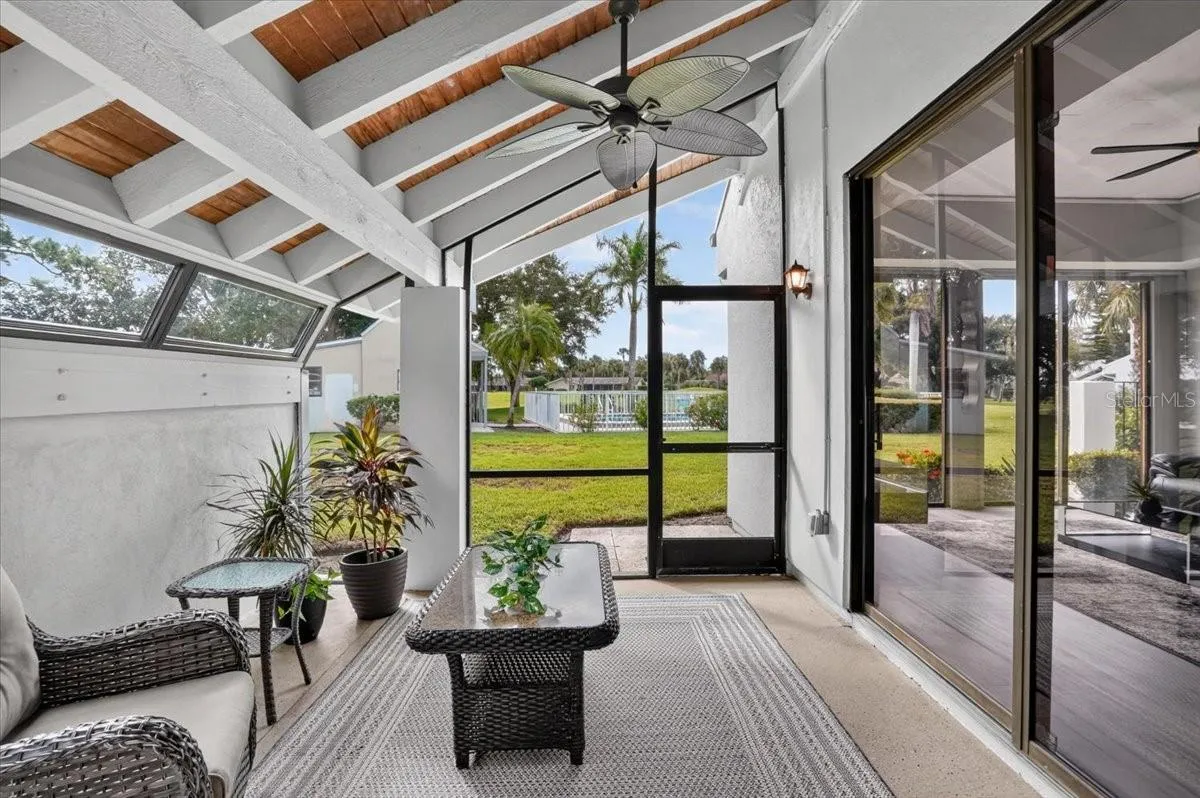 lanai with sliders from kitchen and living room