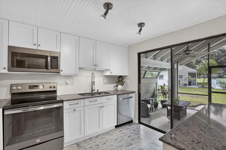 kitchen with slider to the lanai