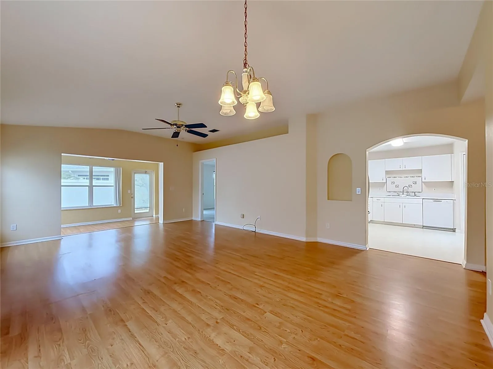Dining area out to Family room with Kitchen to right