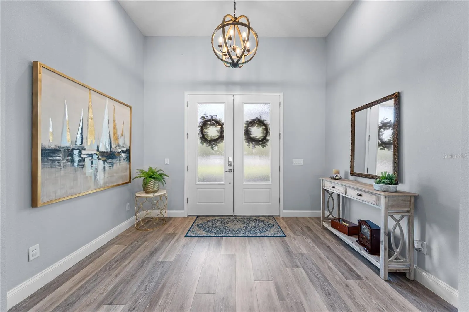 Interior view of the front entry doors and foyer