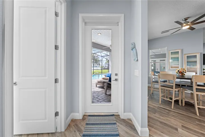 Door leading to the lanai from the 2nd primary bedroom area and just off the kitchen/dinette.
