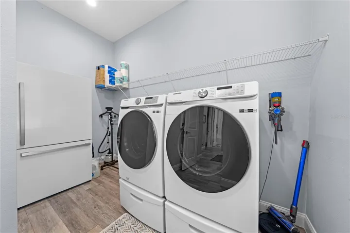 Laundry room and it is plumbed for a sink.