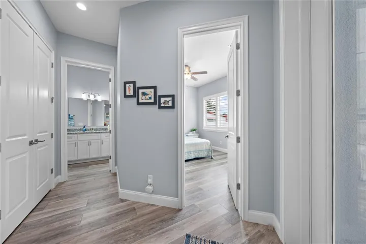 2nd primary hallway showing bathroom and 2nd primary entrance