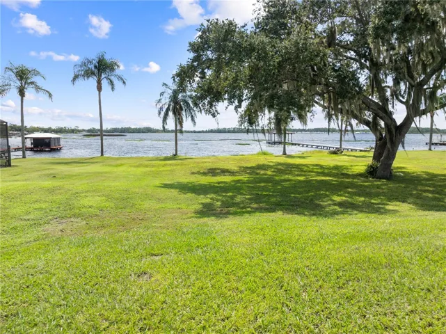 Spacious backyard overlooking Lake Center