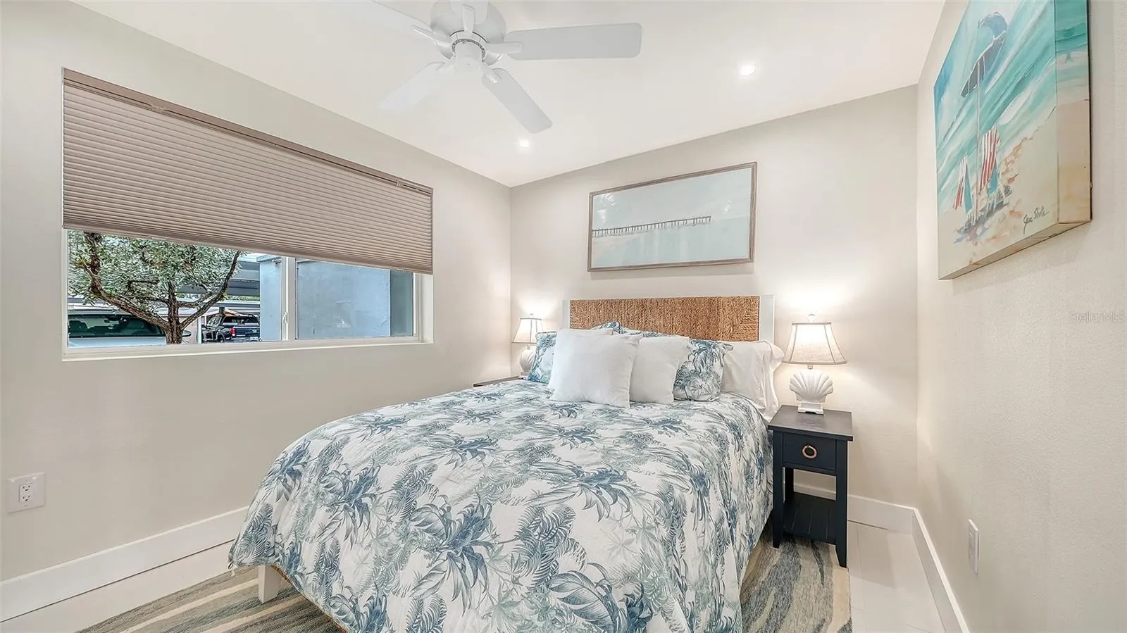 Guest bedroom with California built in closets.