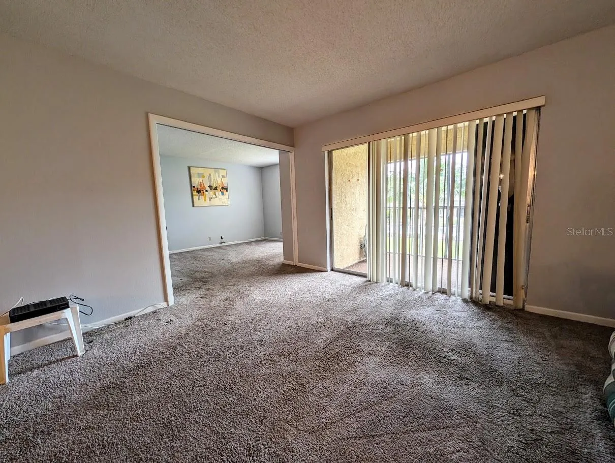 Entry to 2nd bedroom with open pocket door