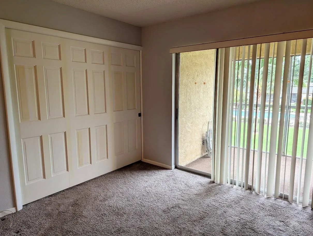 Entry to 2nd bedroom with pocket door fully closed