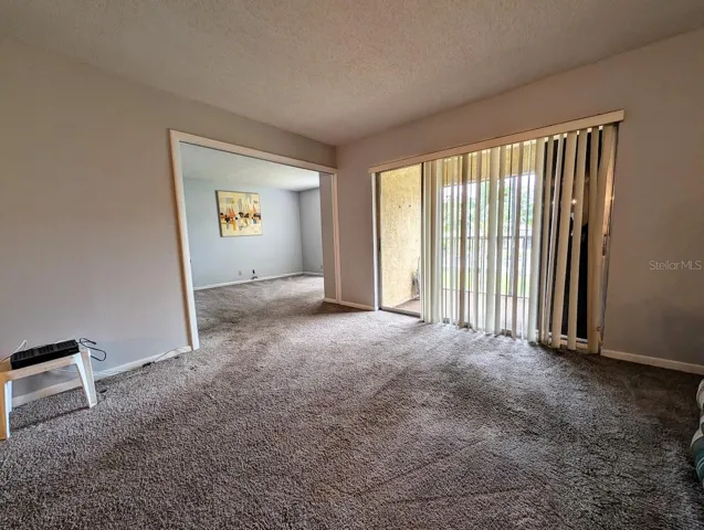 Entry to 2nd bedroom with open pocket door