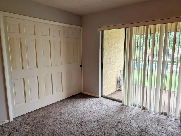 Entry to 2nd bedroom with pocket door fully closed