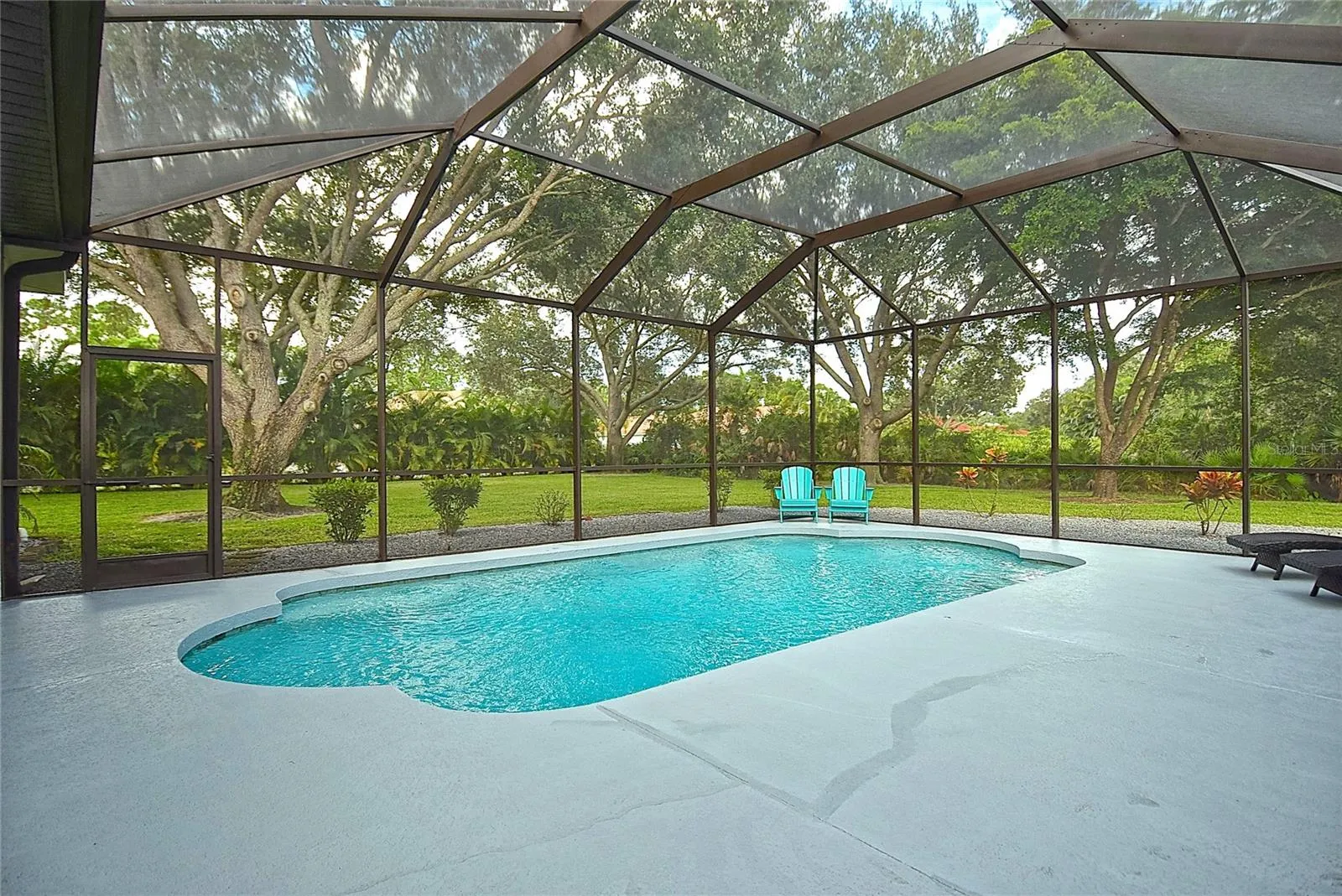 Pool and screened enclosure
