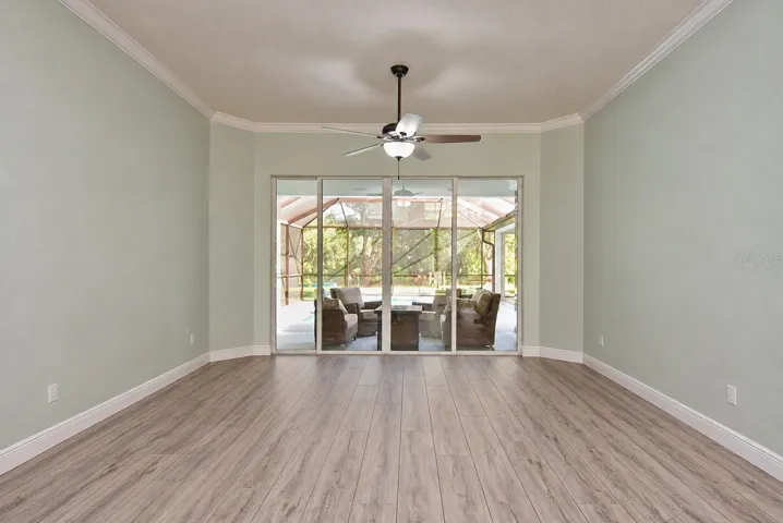 Front living room, virtually staged, gym equipment digitally removed