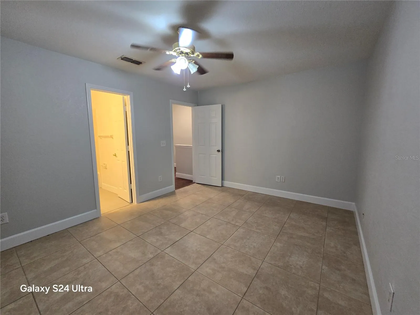 1st bedroom with tile floors