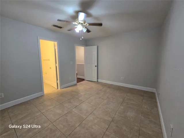 1st bedroom with tile floors