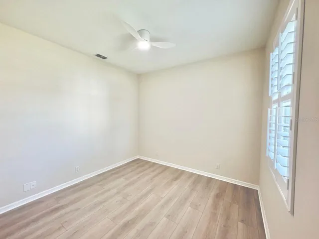 Guest Bedroom with Plantation Shutters