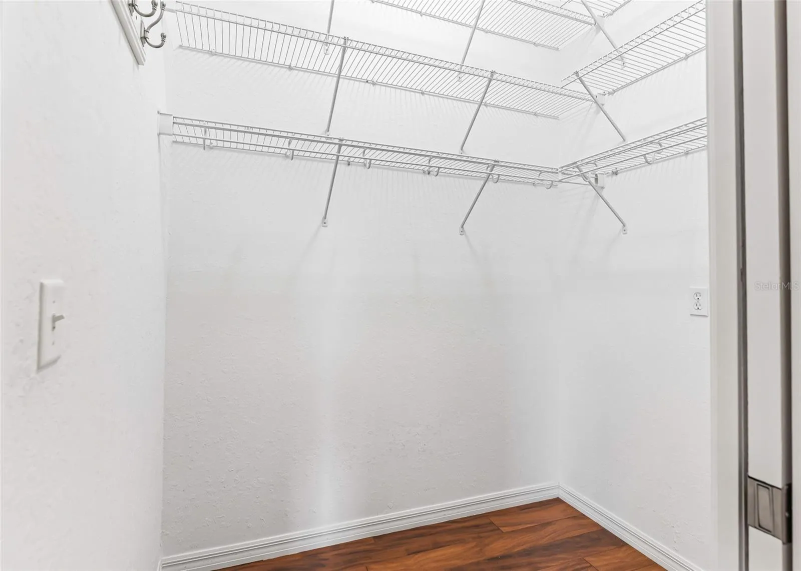 walk in closet in the primary bedroom