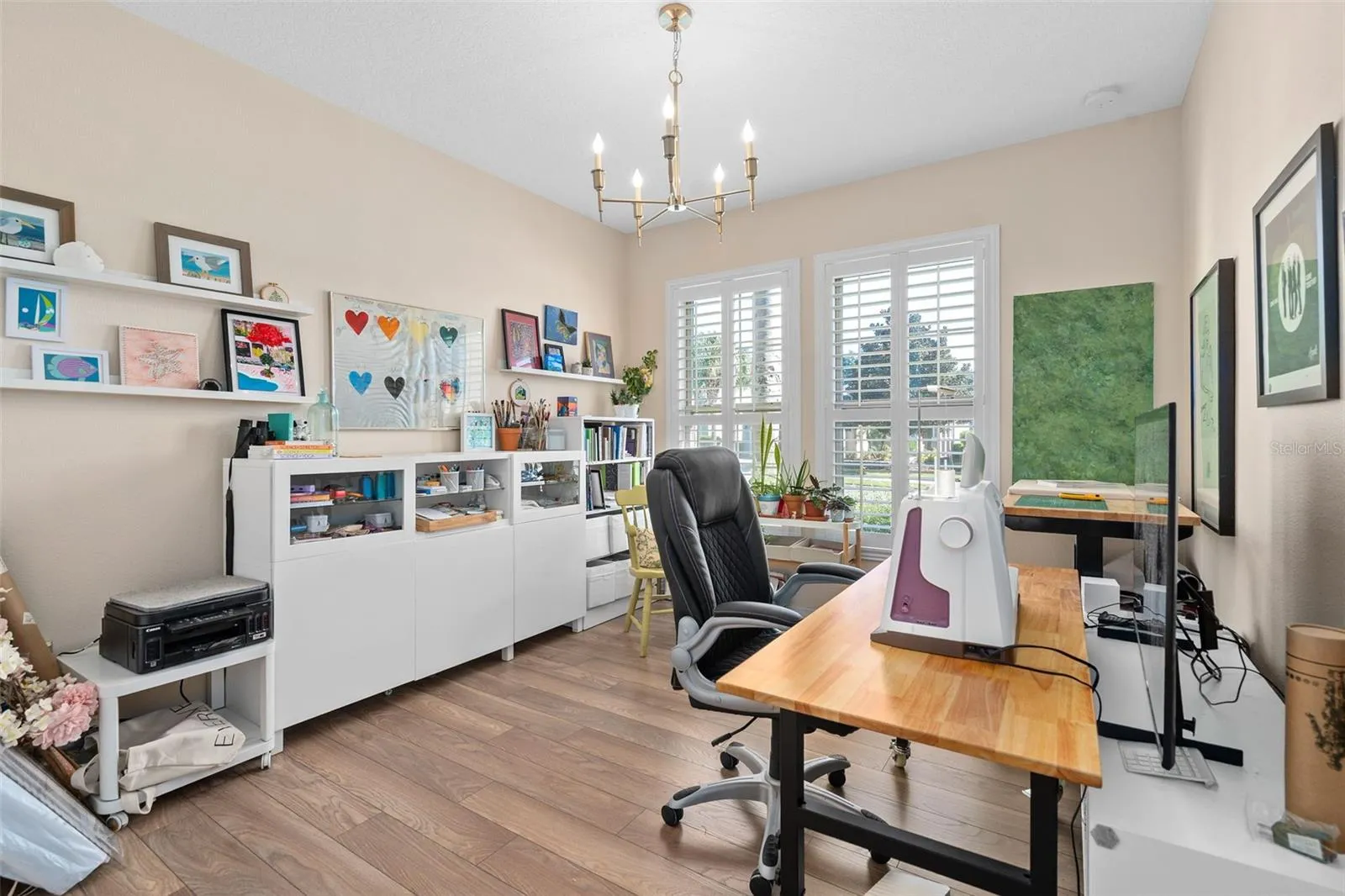 Bedroom 3 is utilized as a craft Room and offers LVP flooring