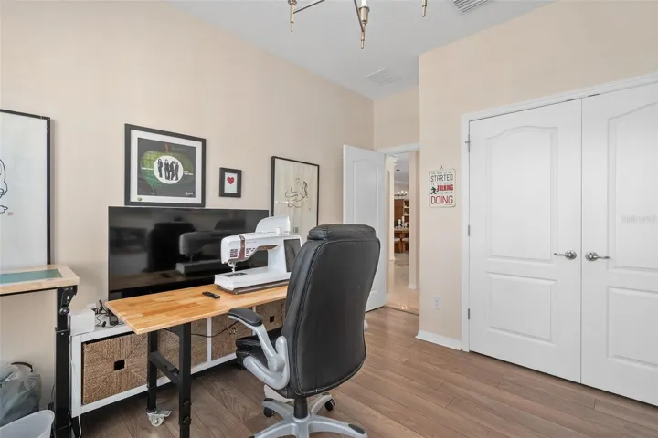 Bedroom 3 is utilized as a craft Room with LVP flooring