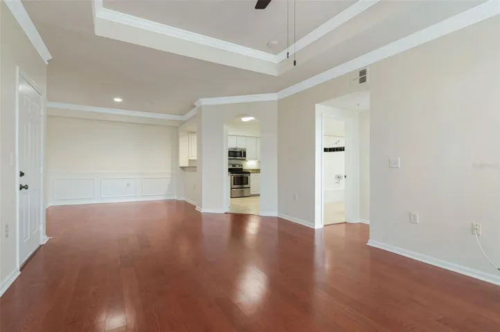 View Living Room to Dining and Kitchen