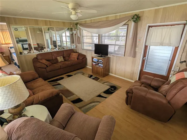 Living room, door leads to screen lanai