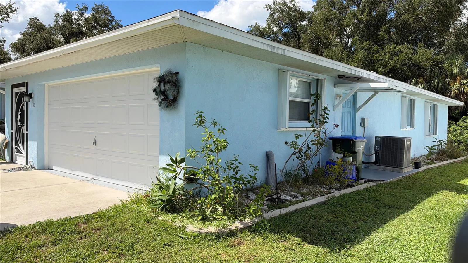 Right side of garage and side door entry