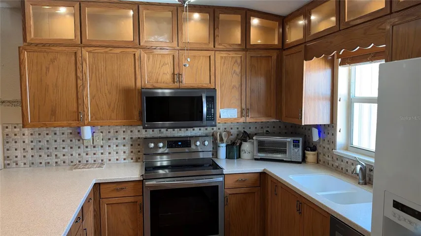 Additional lighted cabinets