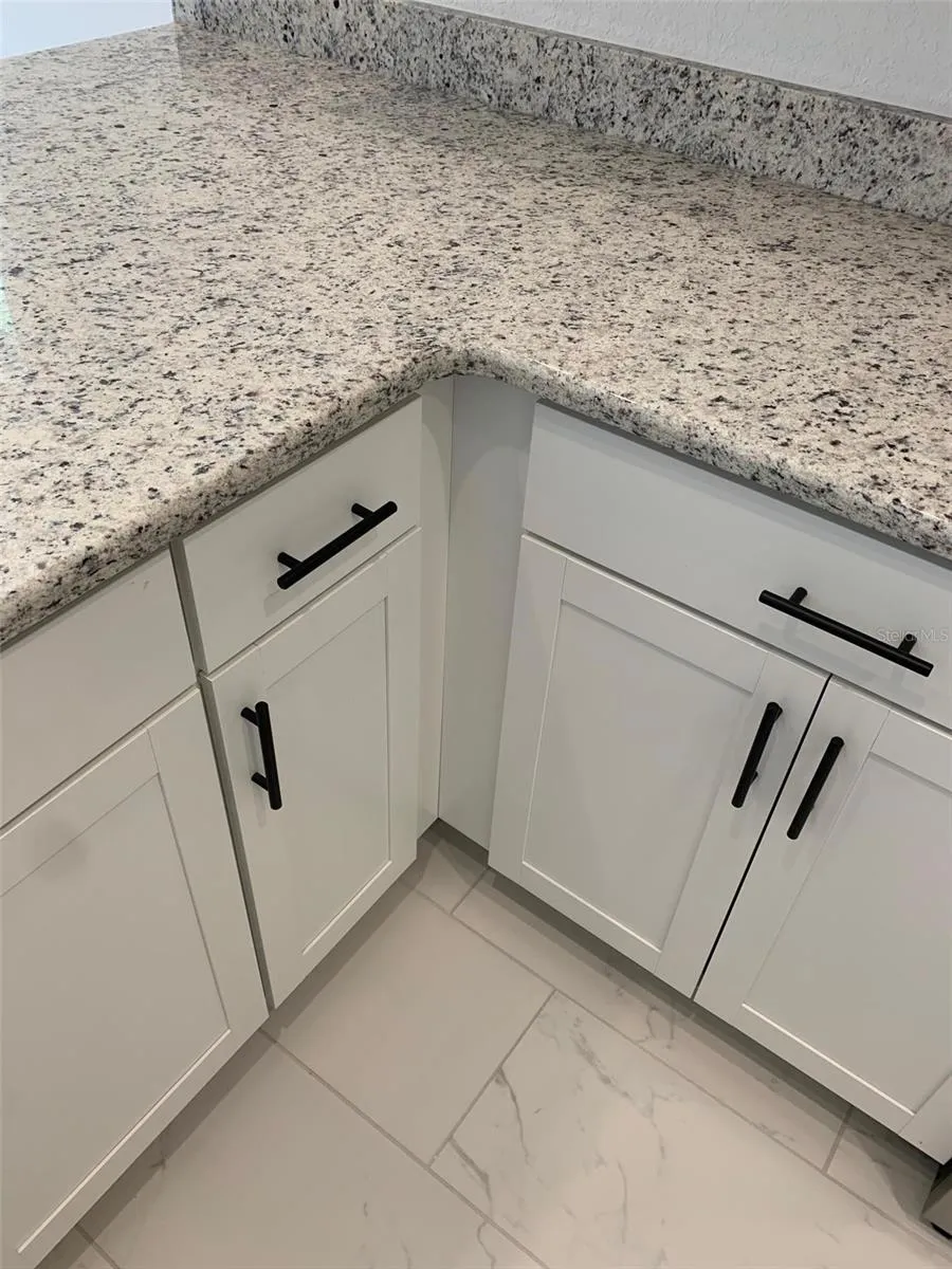 Cabinets/countertops/flooring