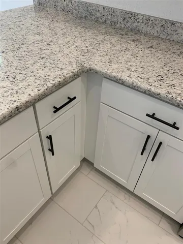 Cabinets/countertops/flooring
