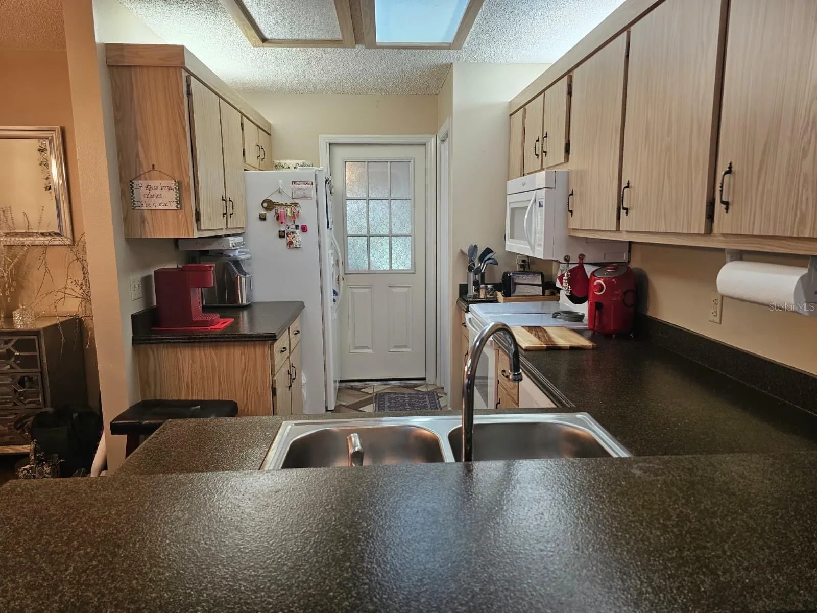 Looking into the kitchen from the bar top