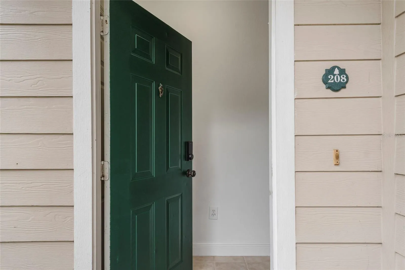 Welcome Home! Front door is equipped with keyless entry system.