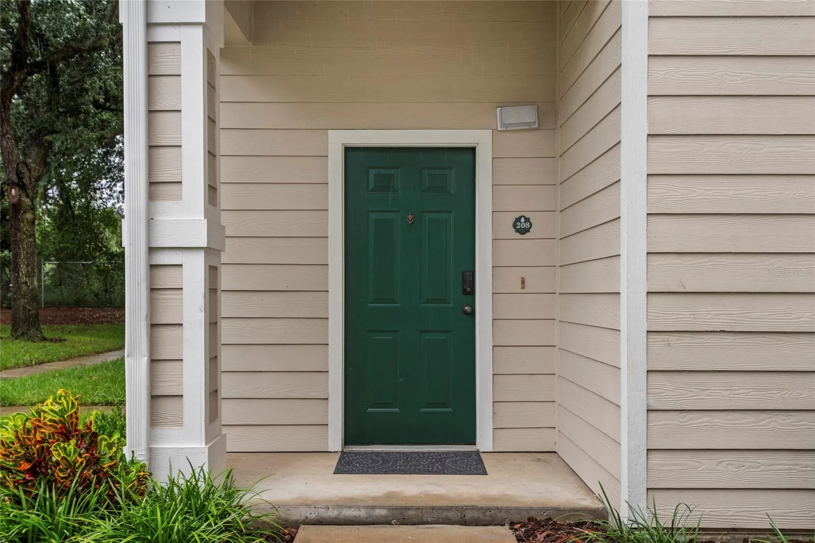 The front door has been freshly painted with the approved community color. Waiting on its new owner.