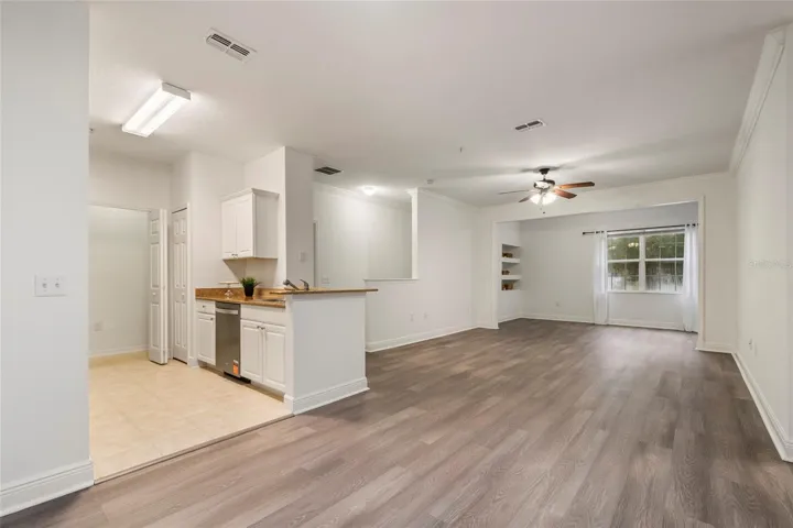 The full view of the expansive combination of Kitchen, dining, family and alcove. Generously sized at 1453 square feet the 3 bedrooms and 2 baths open floor plan is totally move in ready.