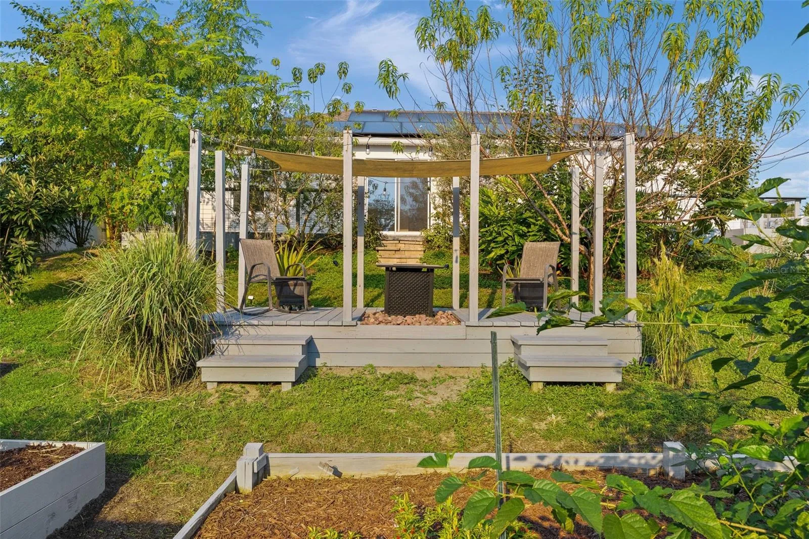 COVERED FOR THE SUNNY DAYS - EASILY REMOVABLE FOR THE FIRE PIT!