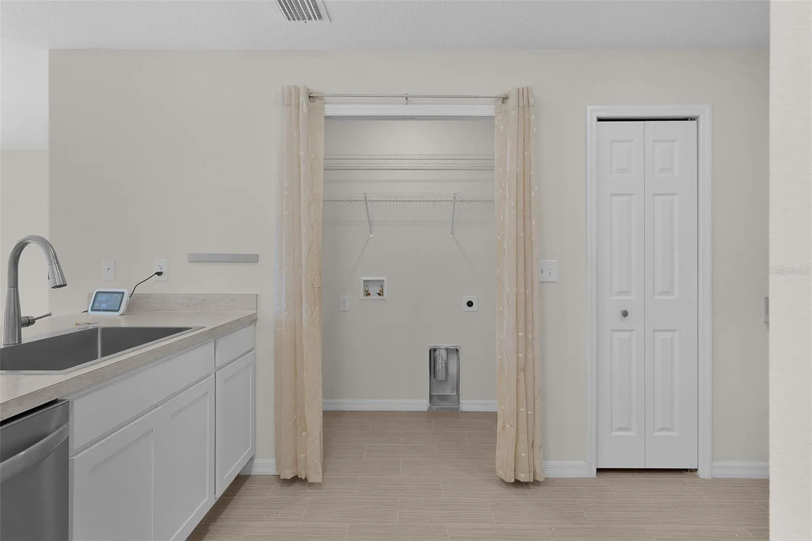 LAUNDRY INDOORS IS A PLUS!