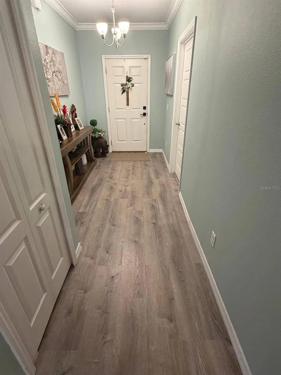 Entry way + guest room on right.