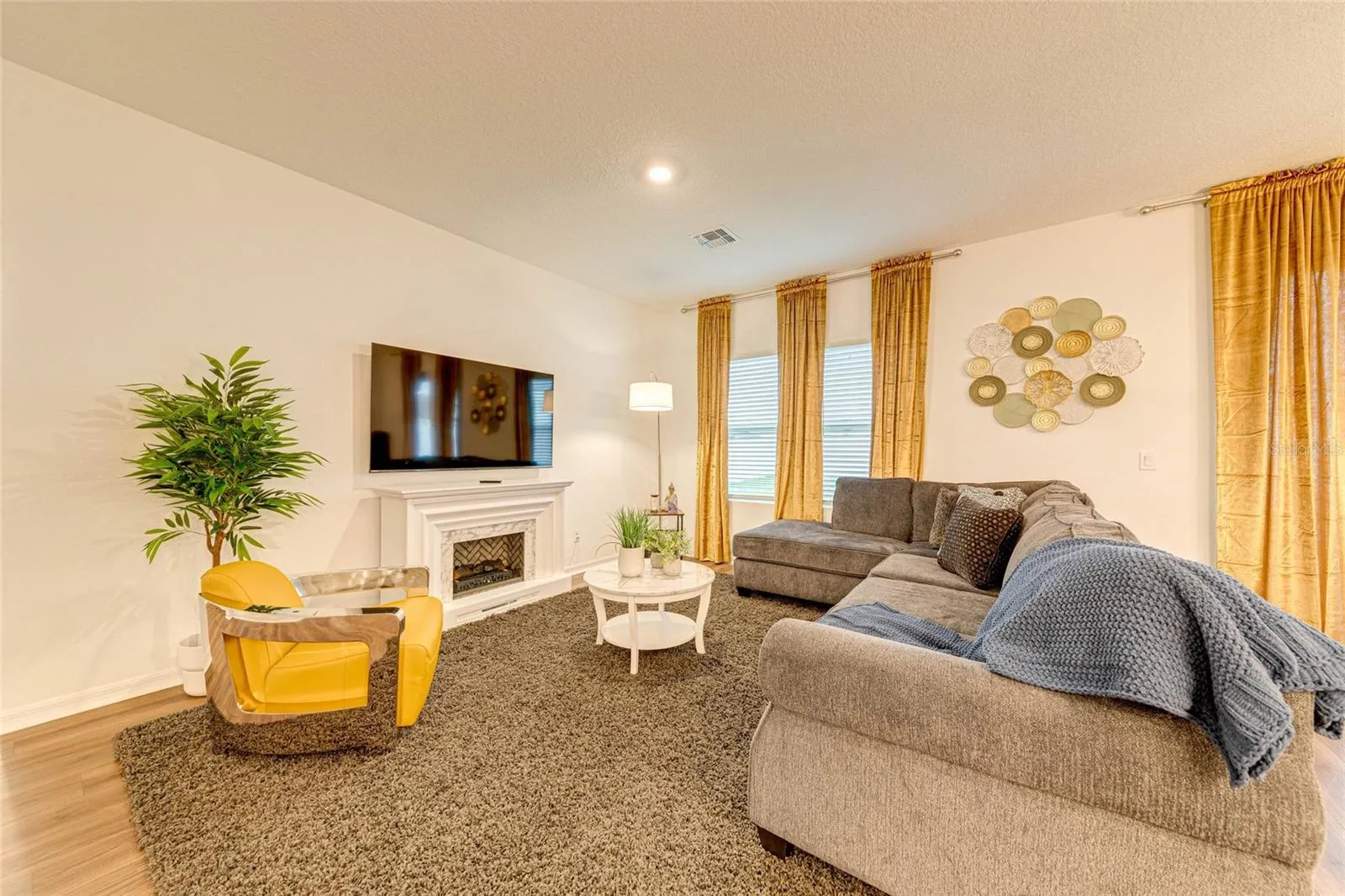 7. Living Room    Comfortable main living area with TV and plenty of space to relax and entertain.