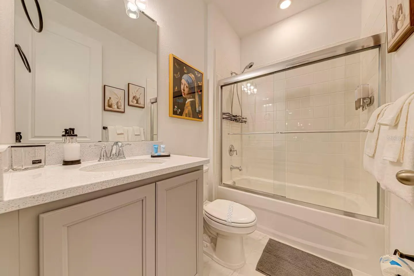 Bathroom 3    Bright full bathroom with clean finishes and a functional layout.
