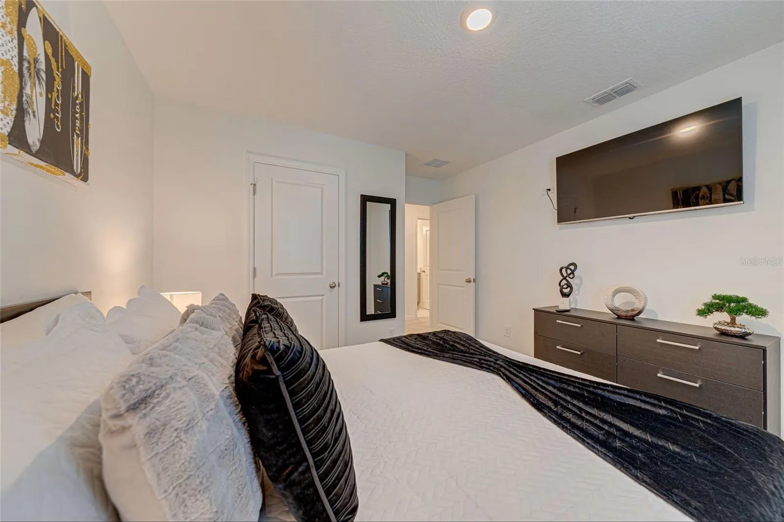 18. Bedroom 2    Fully furnished bedroom with private TV and comfortable sleeping accommodations.