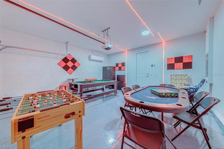 17. Game Room – Foosball and Games    Game room with foosball table, game table, and plenty of space for family and guests.