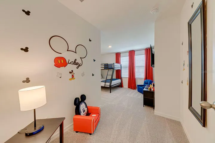 * Themed Bedroom    Fun themed bedroom with playful decor, private TV, and a welcoming atmosphere.