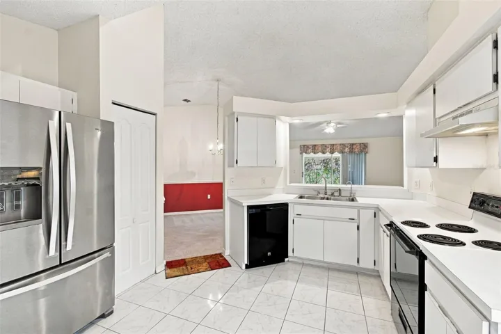 Modern kitchen featuring an open-concept layout with a view of the living area.