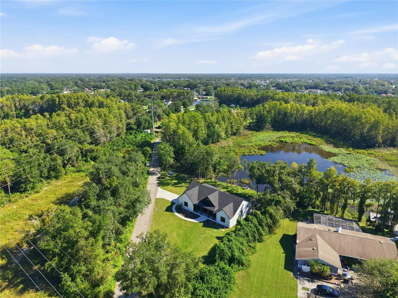 Aerial view of the lot with your privacy and large parcels of neighboring homes and their privacy as well.