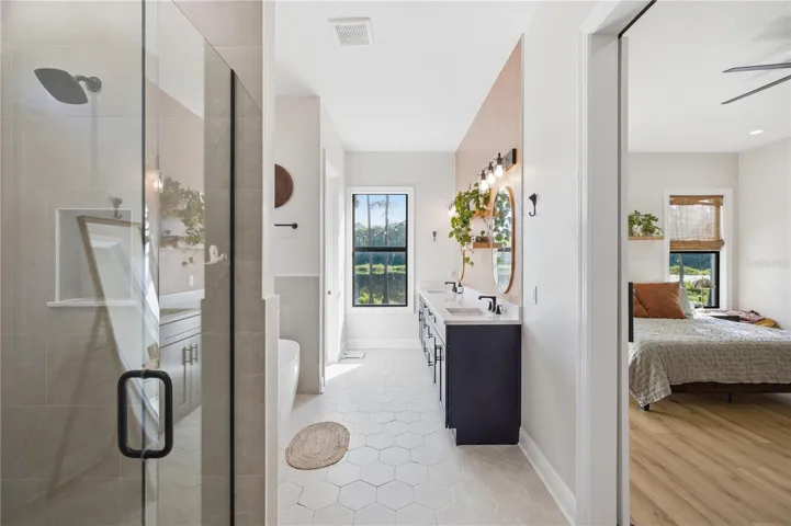 Walk-in shower with double Showerhead/Rain head combo.