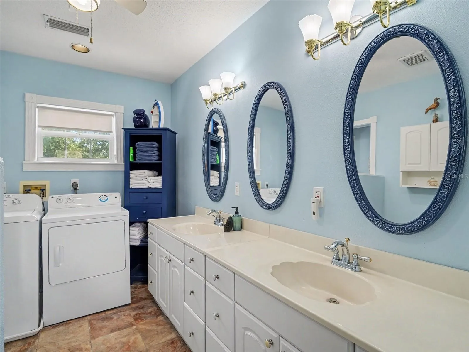 Primary bedroom with laundry