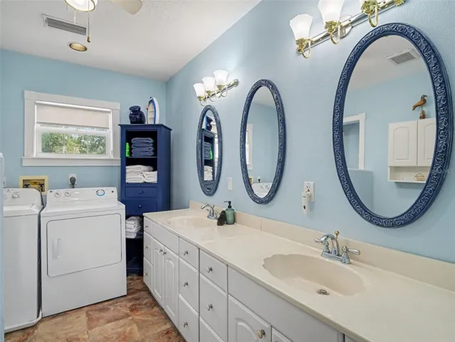 Primary bedroom with laundry