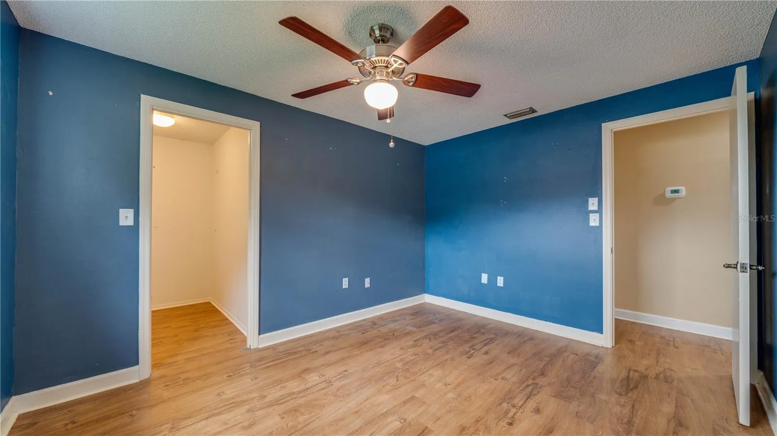 Yes; Bedroom No. 3 also features a walk-in closet.