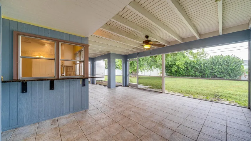 This home has a pass thru window from the kitchen to the lanai making outdoor dining easy and convenient.