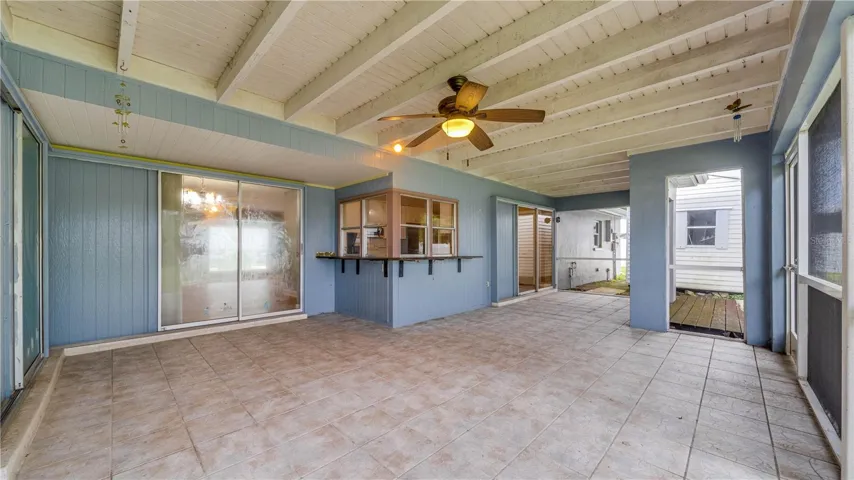 All 3 sets of sliders are pocket sliders providing open air living. The shed offers electric and is elevated.