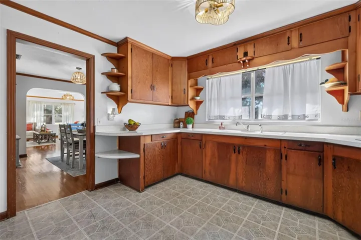 Kitchen with original hard wood cabinets