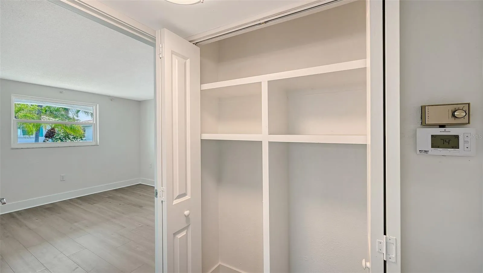 Linen closet in hallway.